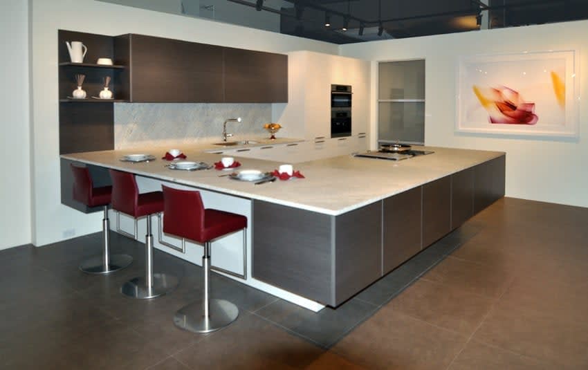 contemporary warm gray and white kitchen vignette featured in eggersmann florida german kitchen showroom in the DCOTA building