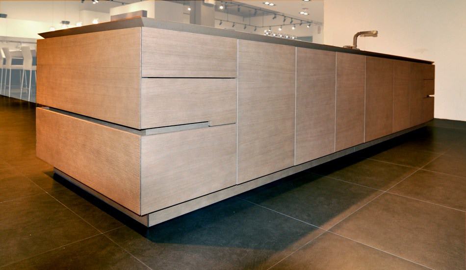 sandlbasted and smoked oak finished cabinetry featured in the eggersmann florida german kitchen showroom