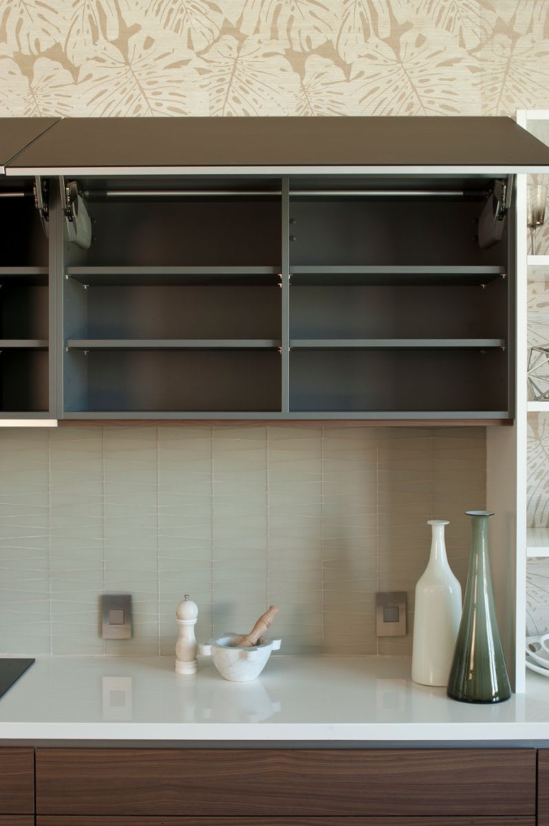 garage-style lifting cabinet fronts on eggersmann kitchens in a palm springs kitchen designed by christopher kennedydoors