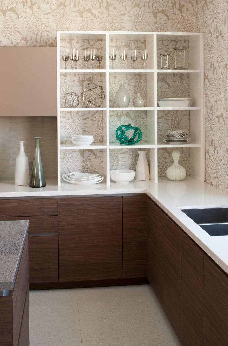 elegant and functional cubby-style niches atop countertops in the corner of an eggersmann kitchen design by christopher kennedy in palm springs