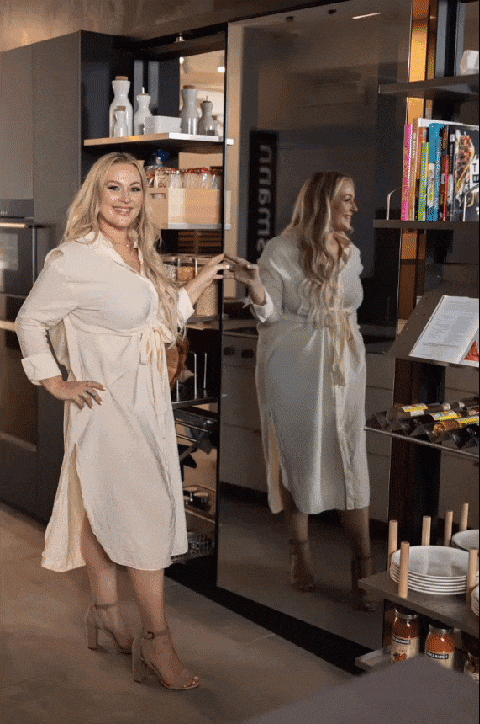 gif of emma in eggersmann la demonstrating the works pantry