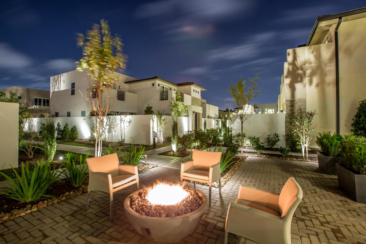 firepit with chairs at the royal oaks courtyard villas in houston