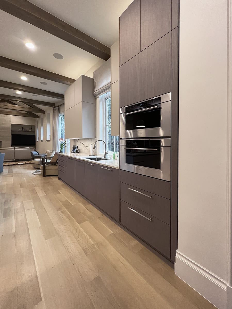 high end appliances in sleek modern luxury cabinetry designed by eggersmann for a highland park home in the dallas metroplex