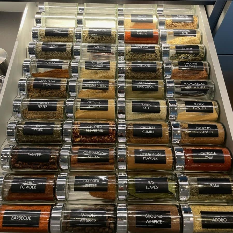 spice drawer organization by hello happy home done in a luxury kitchen remodel in a preston hollow