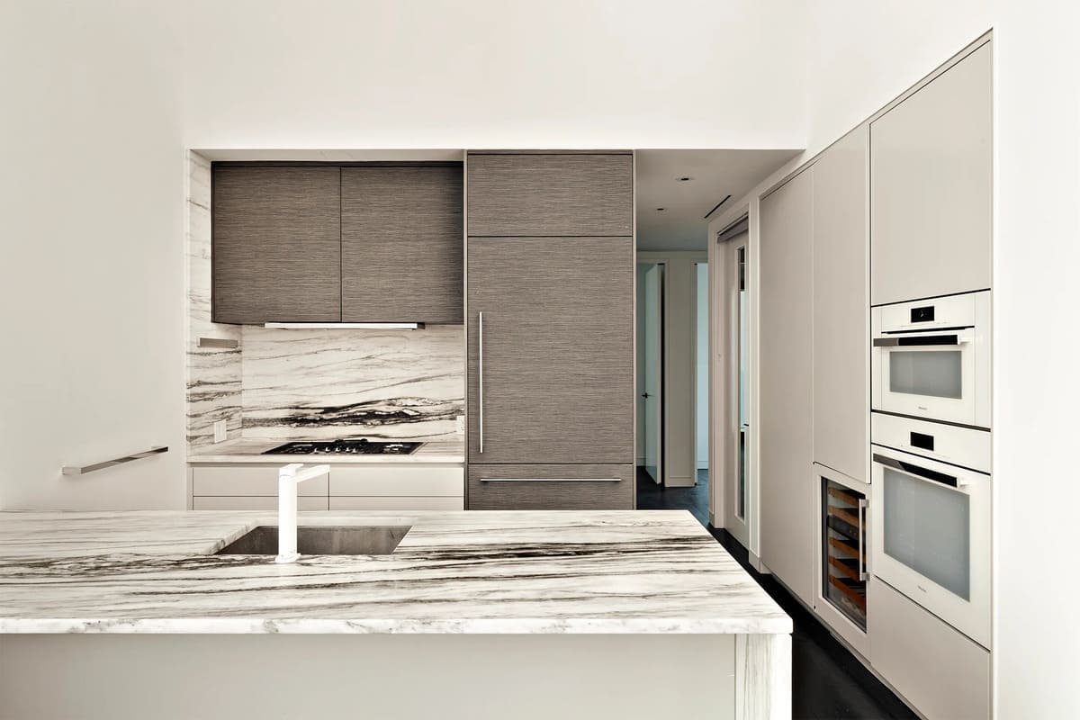 grey and white luxury kitchen designed by eggersmann in a residence of chelsea waterside nyc
