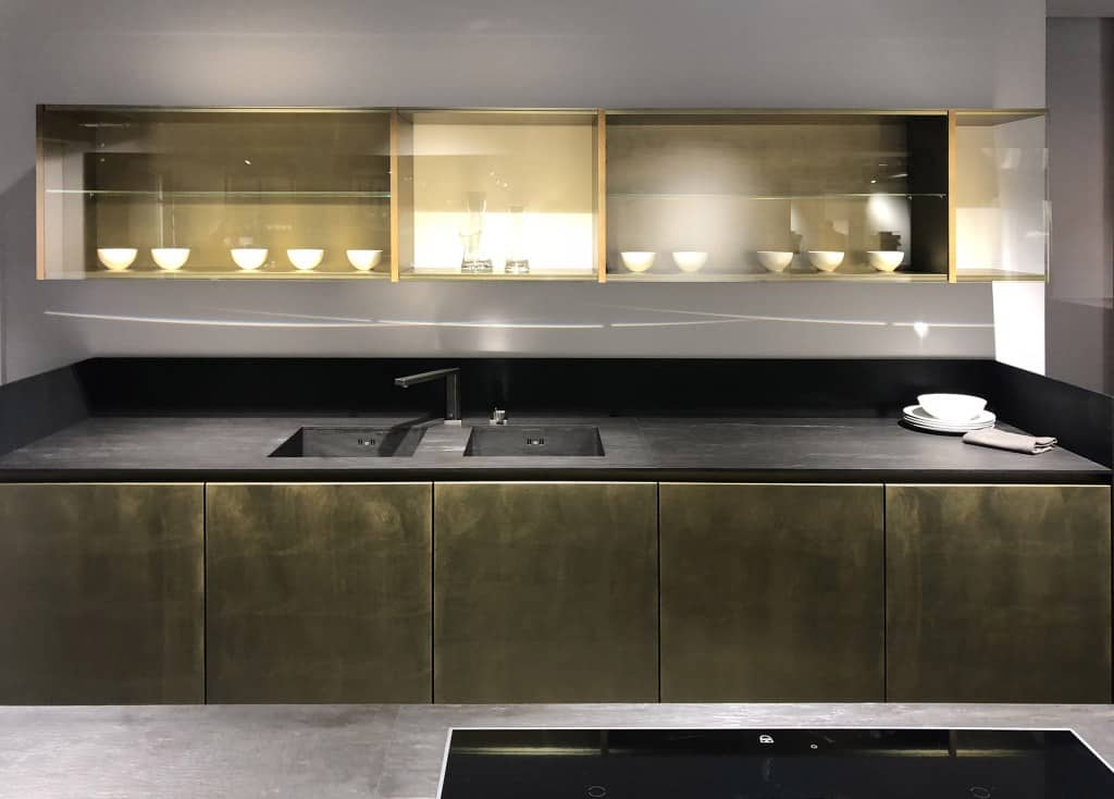 modern kitchen in eggersmann's Cosmos Nero Leathered slate & Lacquered brass