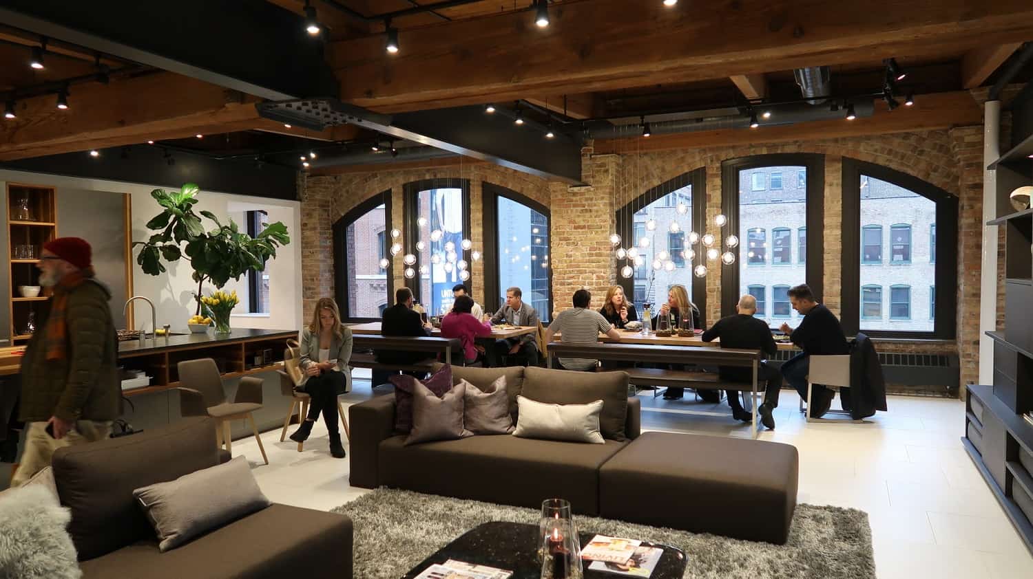 workshop attendees at eggersmann chicago enjoy dinner together before learning how to use instagram for their businesses