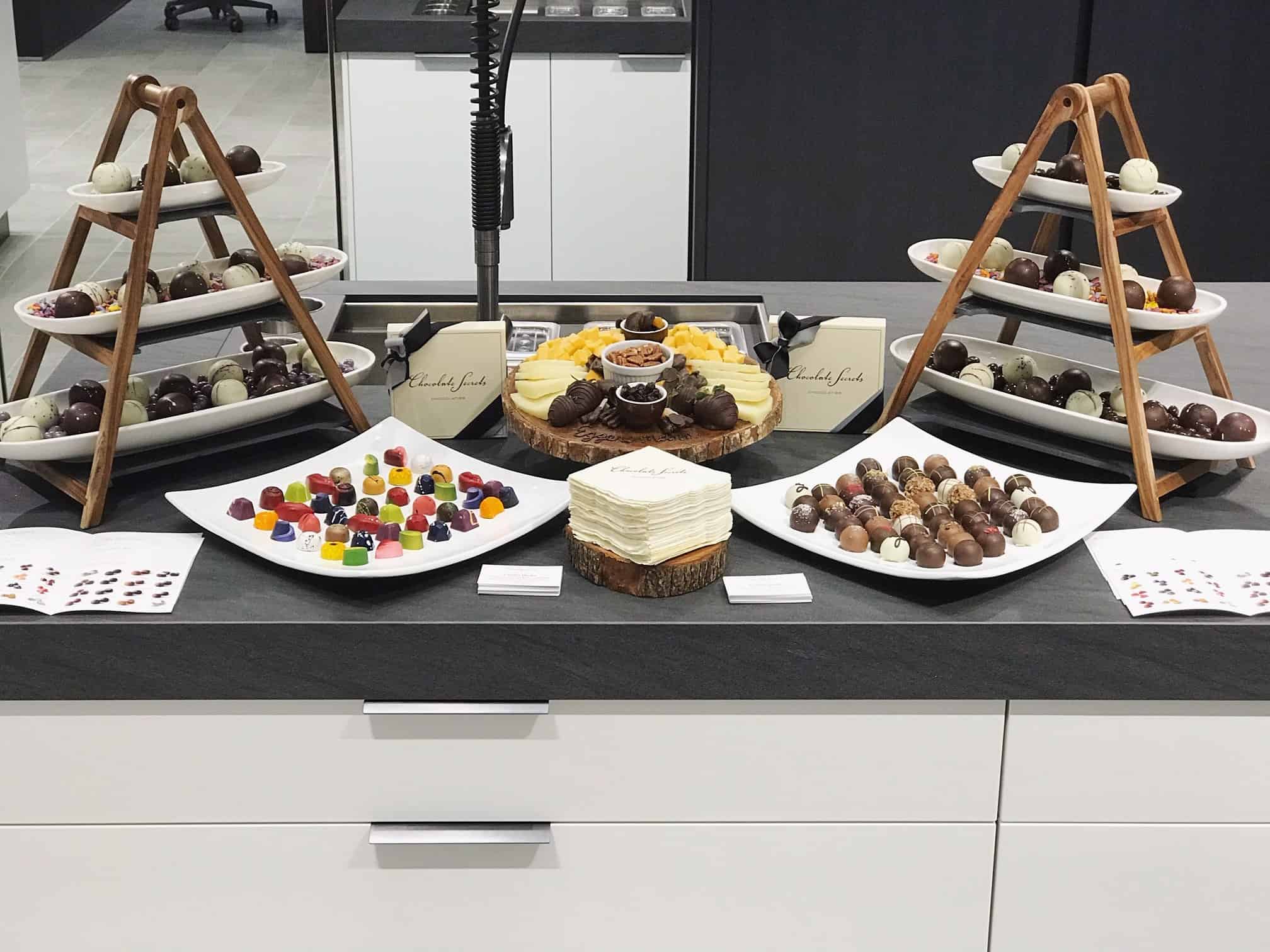 curated art exhibition at eggersmann dallas featured a chocolate buffet by chocolate secrets