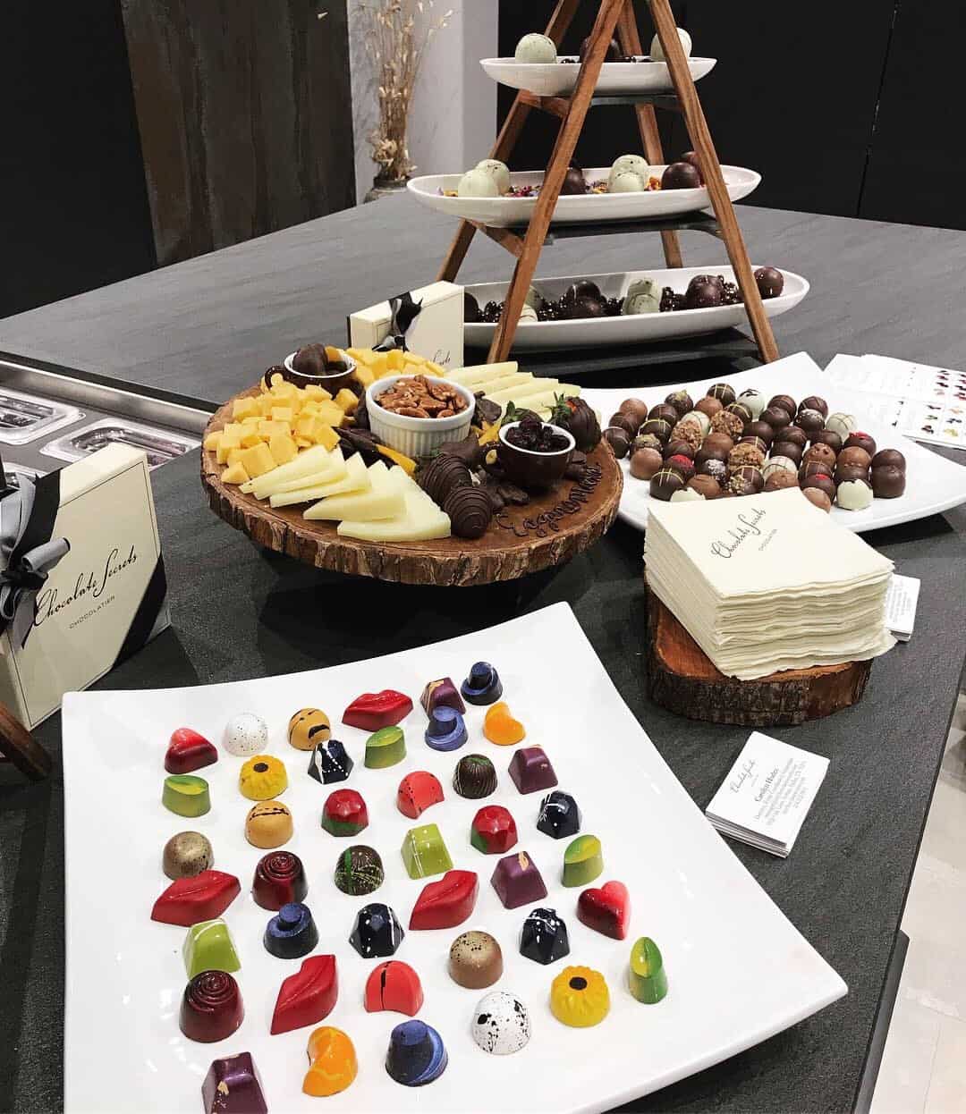 curated art exhibition at eggersmann dallas featured decadent treats by chocolate secrets
