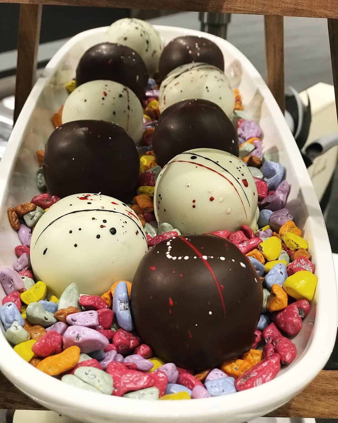 curated art exhibition at eggersmann dallas featured hand-dipped truffles by chocolate secrets