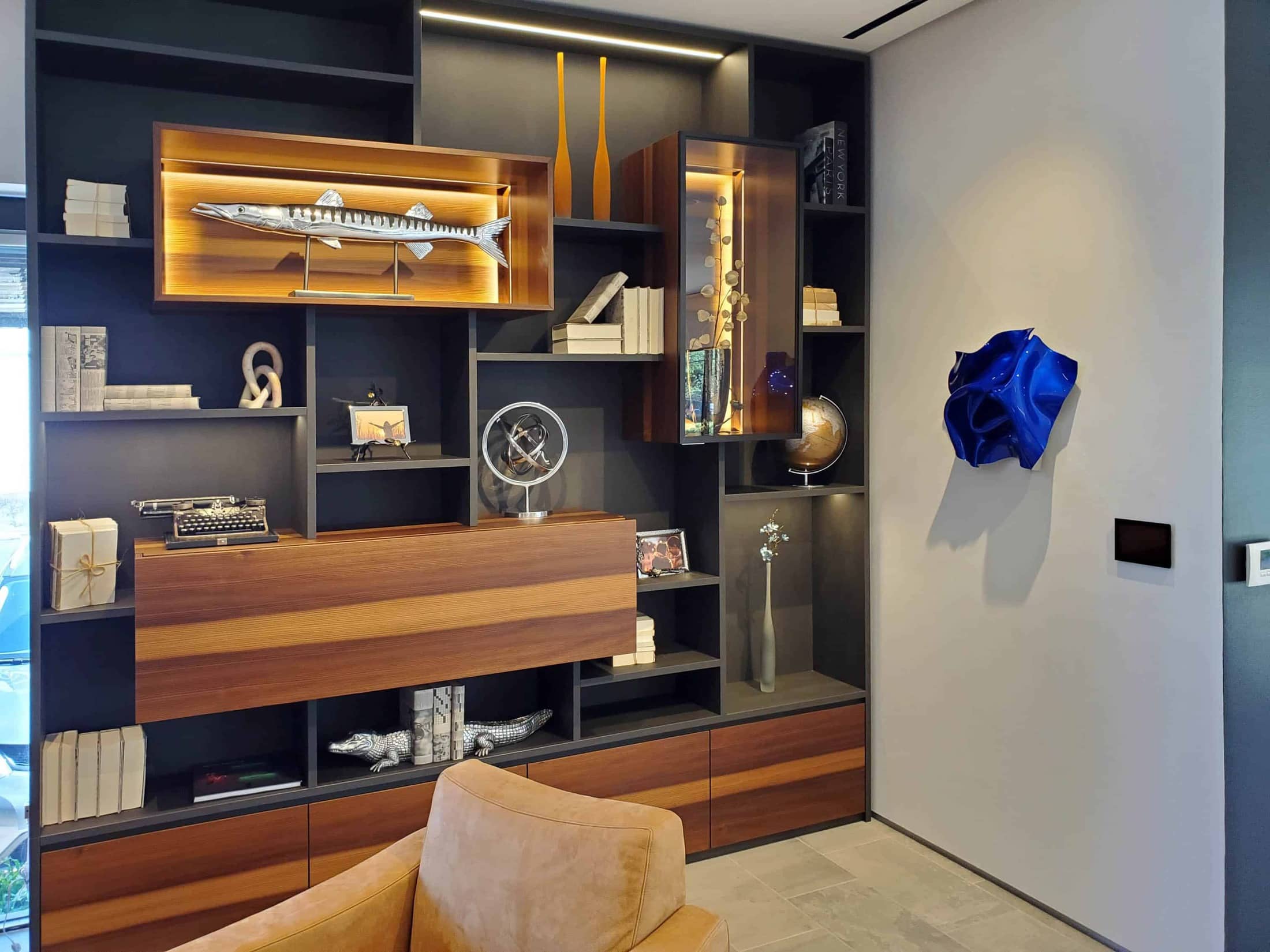 curated art exhibition at eggersmann dallas featured wall sculpture by paul rousso