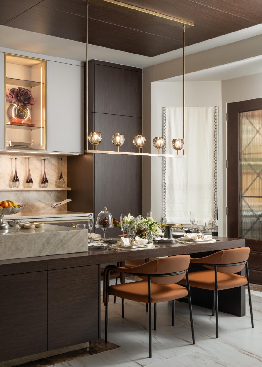 breakfast bar of oversized island of a luxury kitchen remodel in riverstone neighborhood of sugar land texas-kitchen-galley-portrait