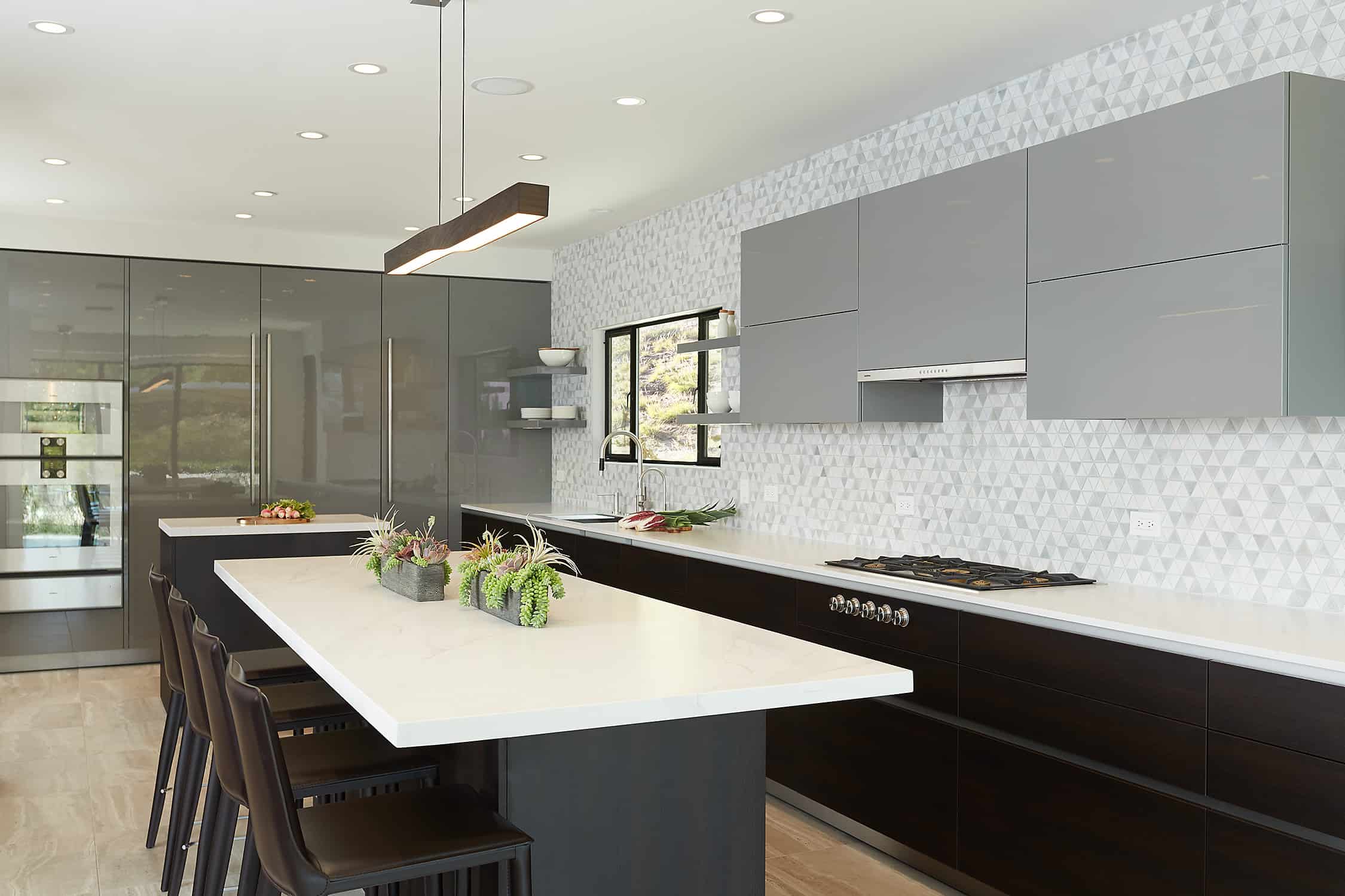 kitchen project completed by eggersmann la features a wall sleek integrated appliances and pantires