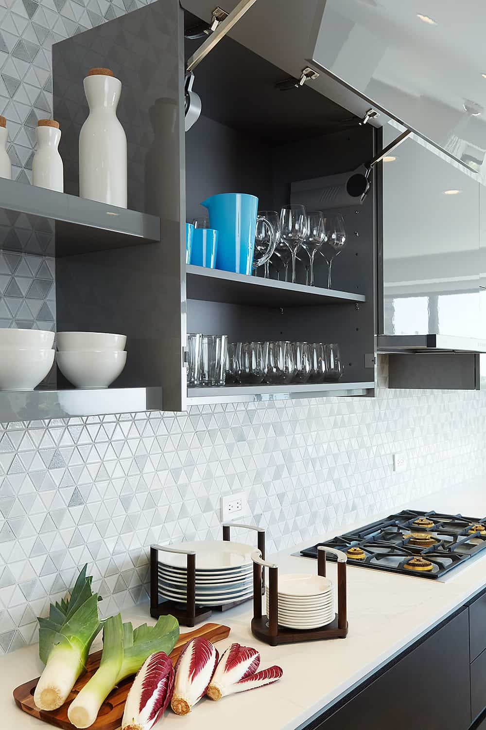 automated opening and closing luxury cabinets of the moussa kitchen project completed by eggersmann la