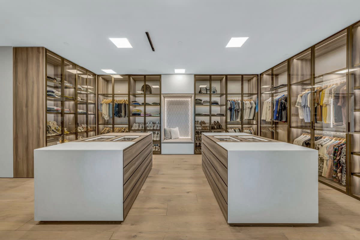 8899 beverly blvd jason oppenheim's master closet with twin islands