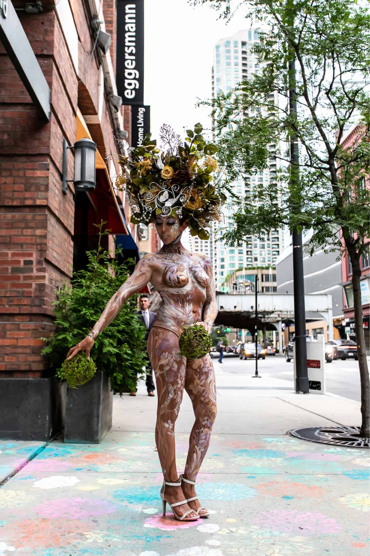 the living statue body painted live art outside the rndd gallery walk 2019 inside the eggersmann chicago showroom