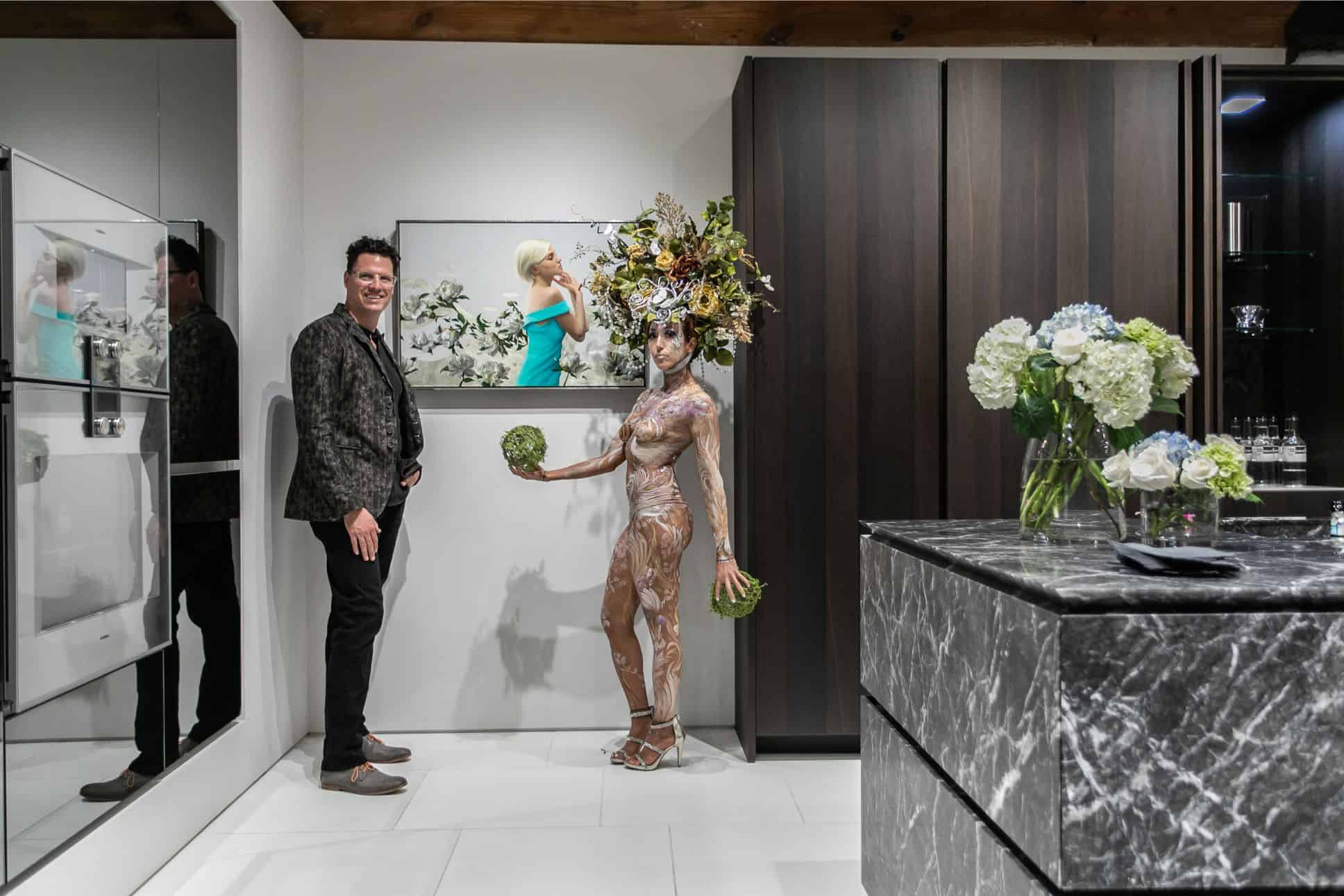 artist michael van zeyl, the living statue, and his artwork at the rndd gallery walk 2019 inside the eggersmann chicago showroom