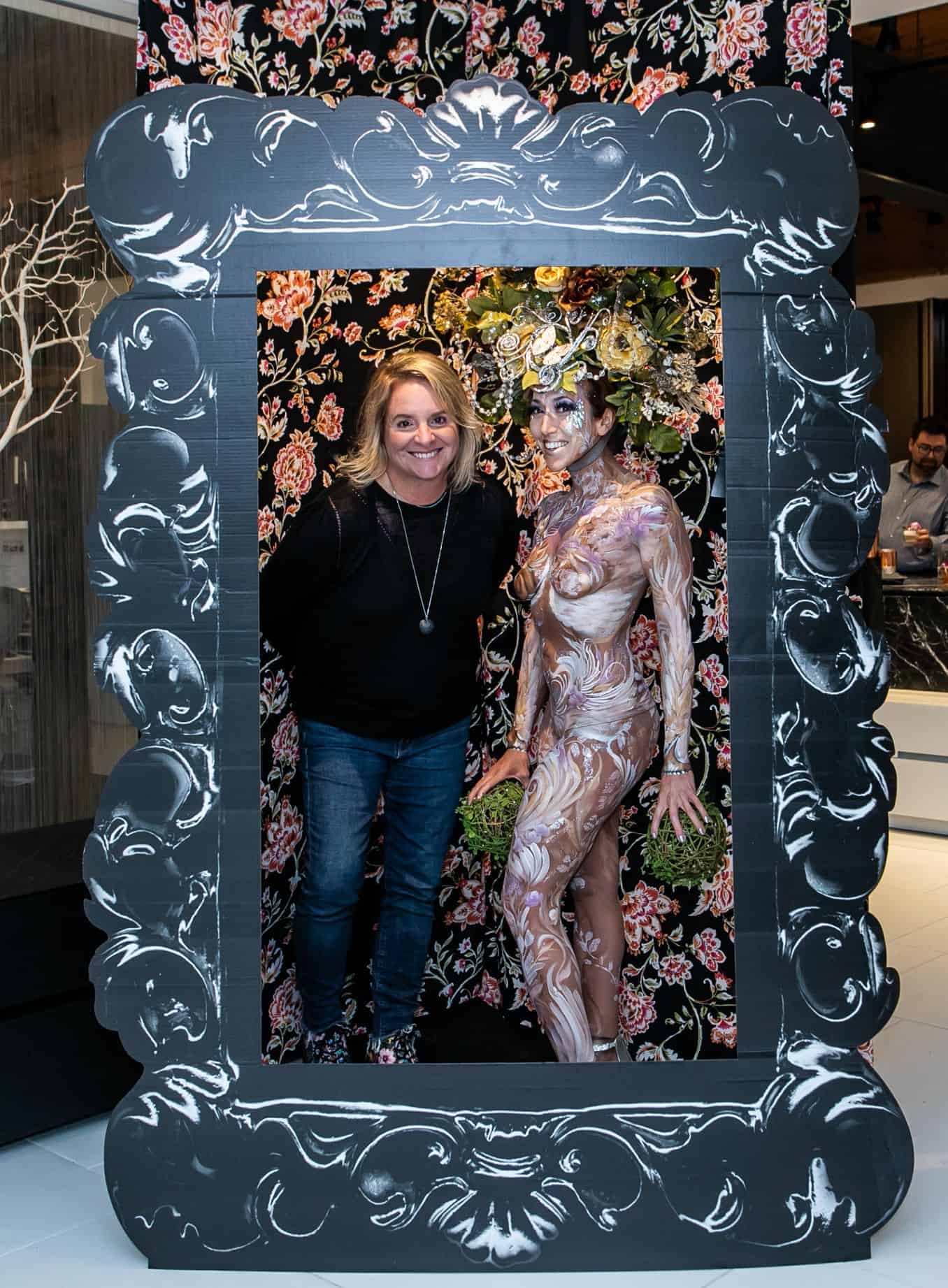 guest posing in photo booth in the eggersmann kitchens chicago showroom during the rndd gallery walk 2019