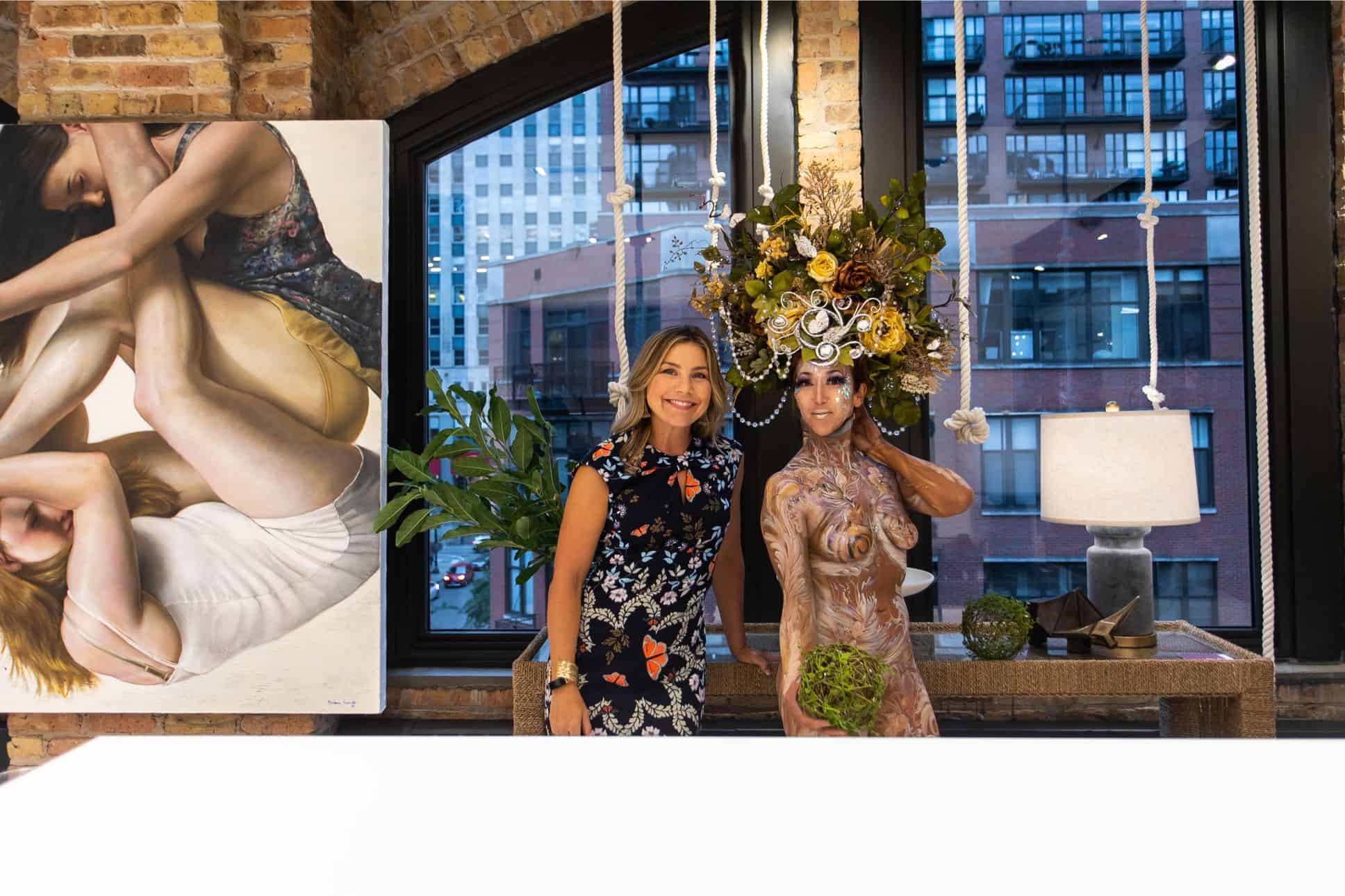 guests with featured artwork in the eggersmann kitchens chicago showroom during the rndd gallery walk 2019