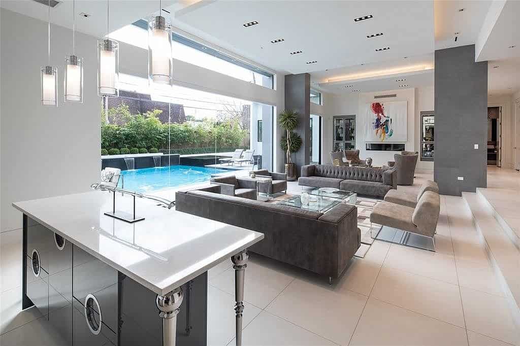 living area and bar off outdoor pool