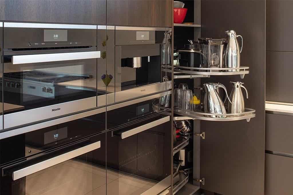 miele appliance set with small appliance pantry installed in eggersmann cabinetry