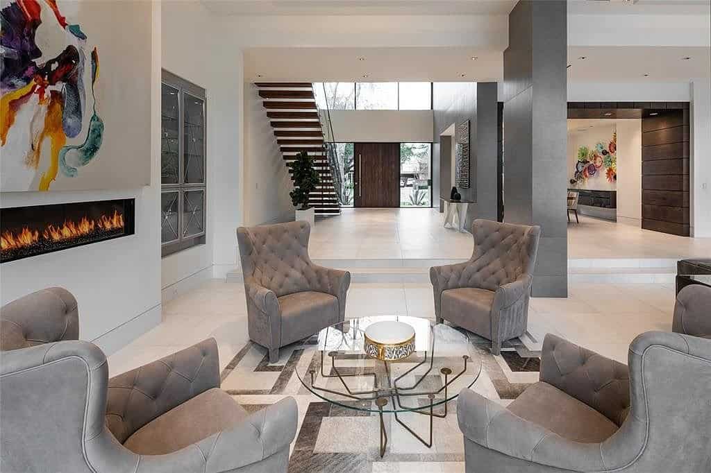 sitting area with traditional furnishings add interest to this contemporary houston home