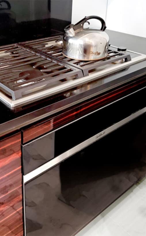 high-end wolf stove in luxury kitchen designed by eggersmann