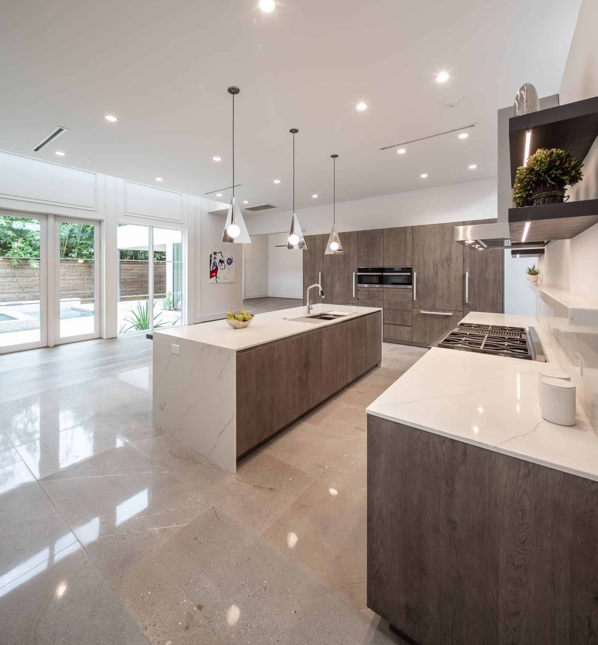 ultra modern kitchen by eggersman in a washington coalition memorial park area home in houston