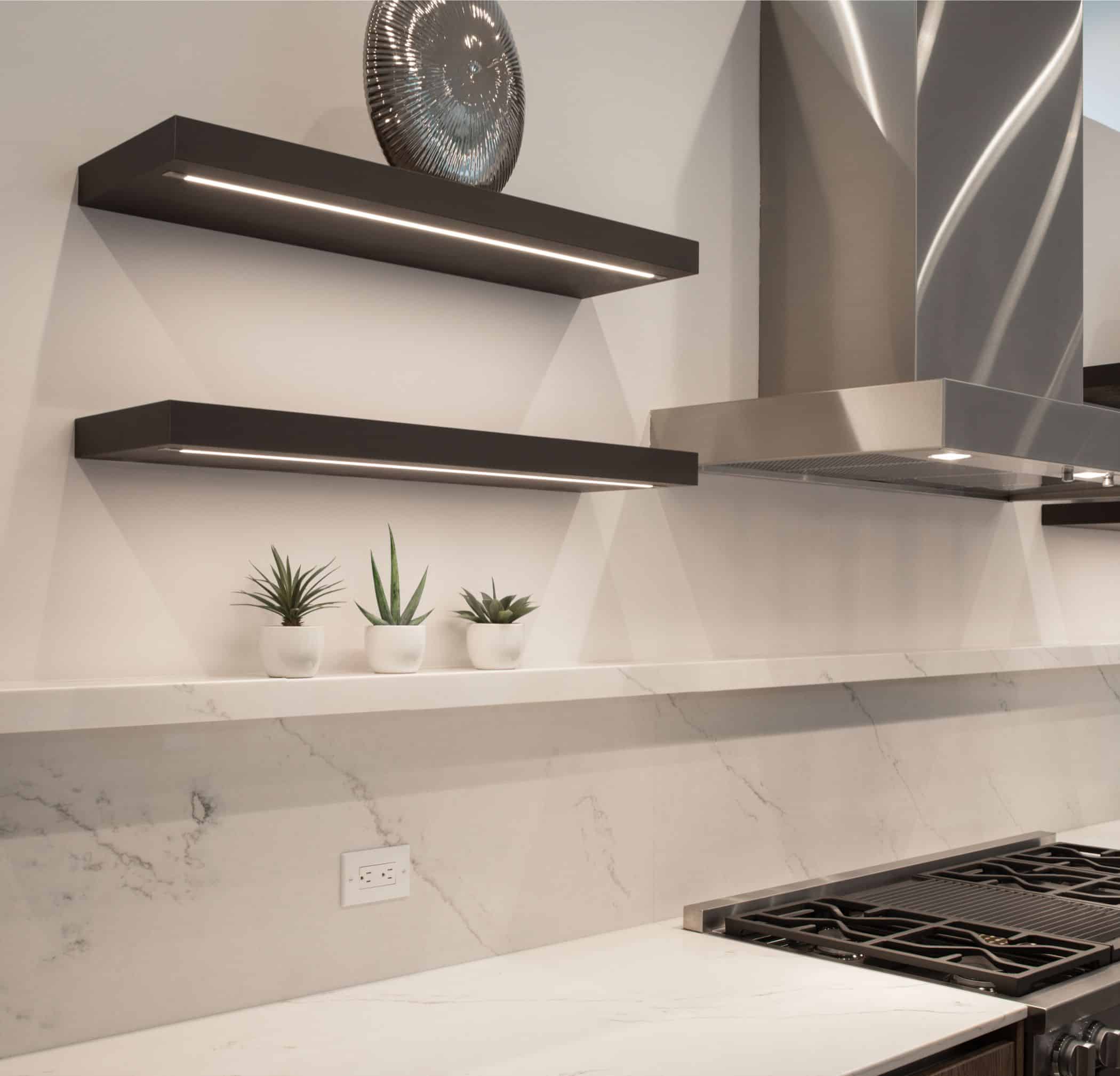 closeup of the new stove with raised ledge detail and display shelves in a washington coalition memorial park area home in houston