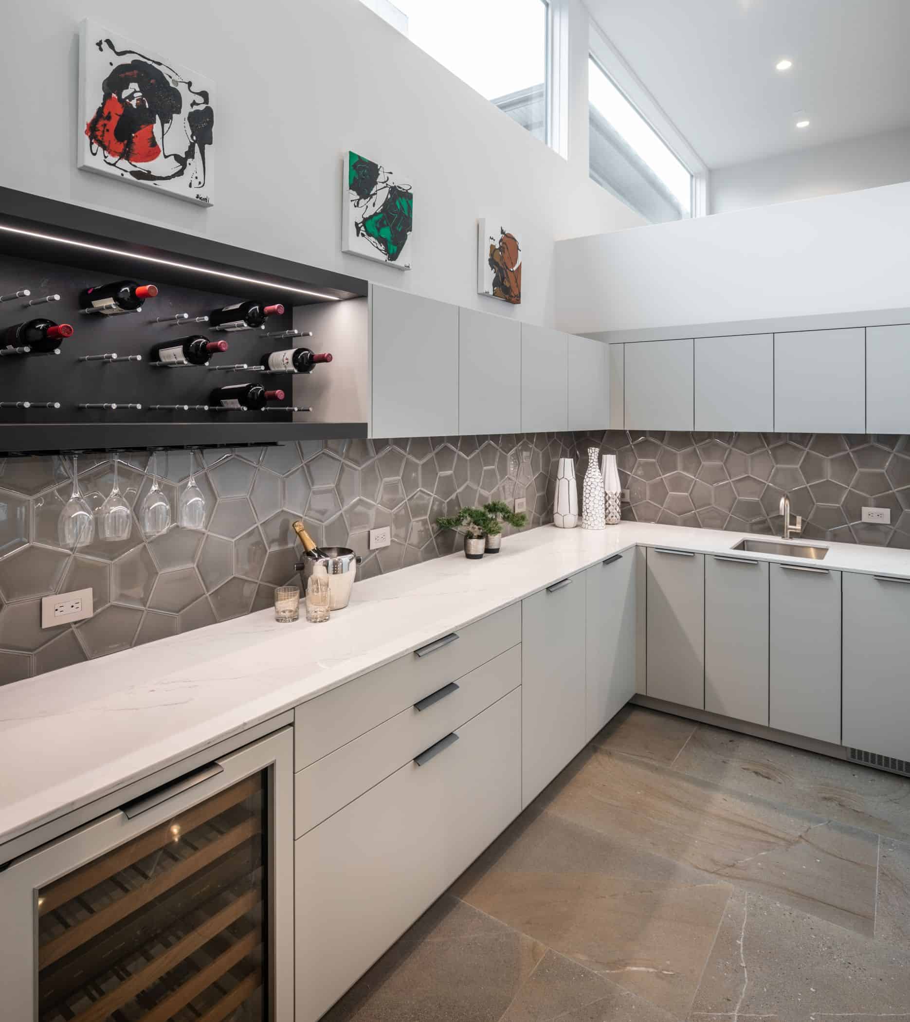 high-end white german cabinets of a newly renovated washington coalition memorial park area home in houston