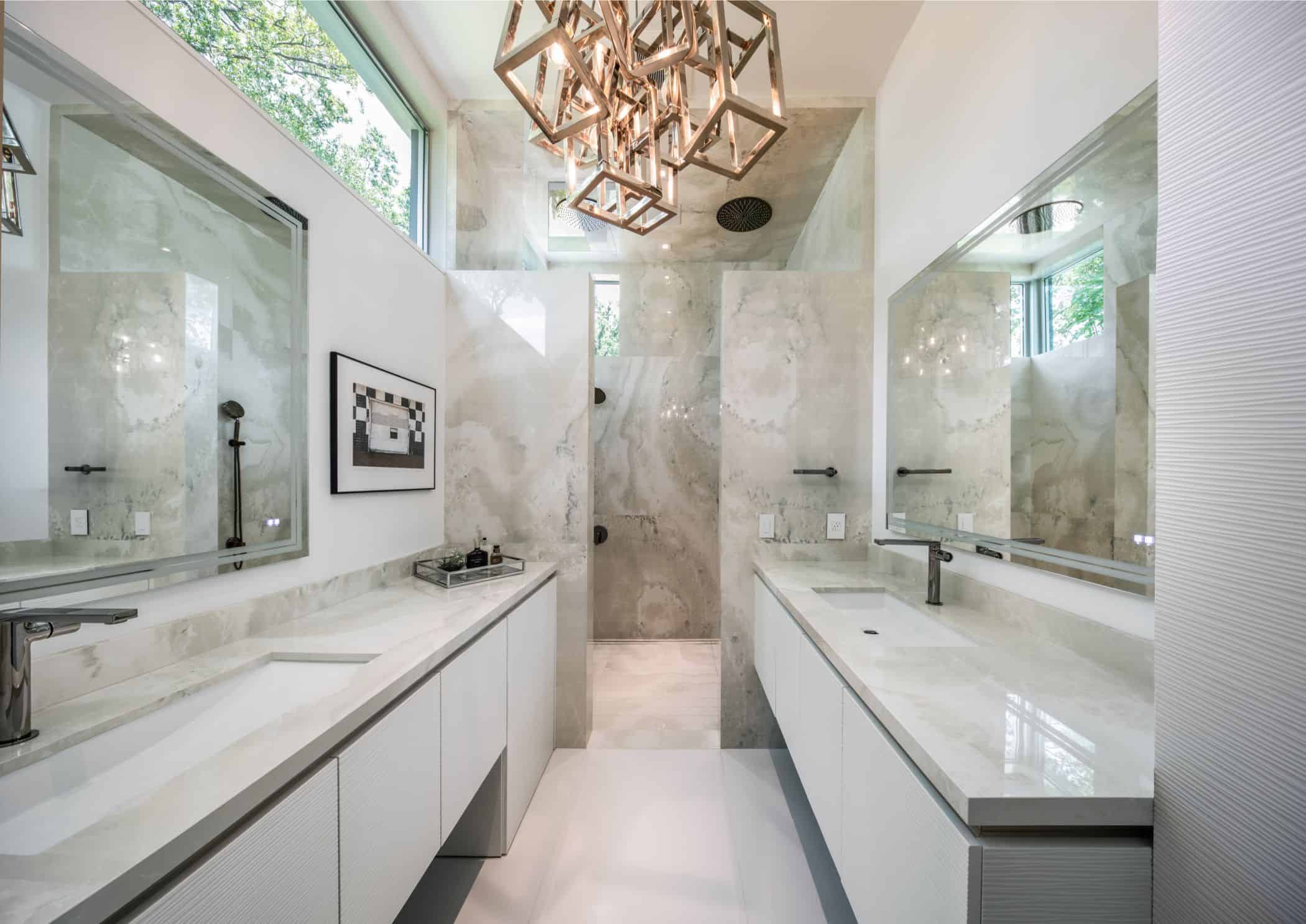 master bathroom fitted by eggersmann in a houston new construction home features trough sinks