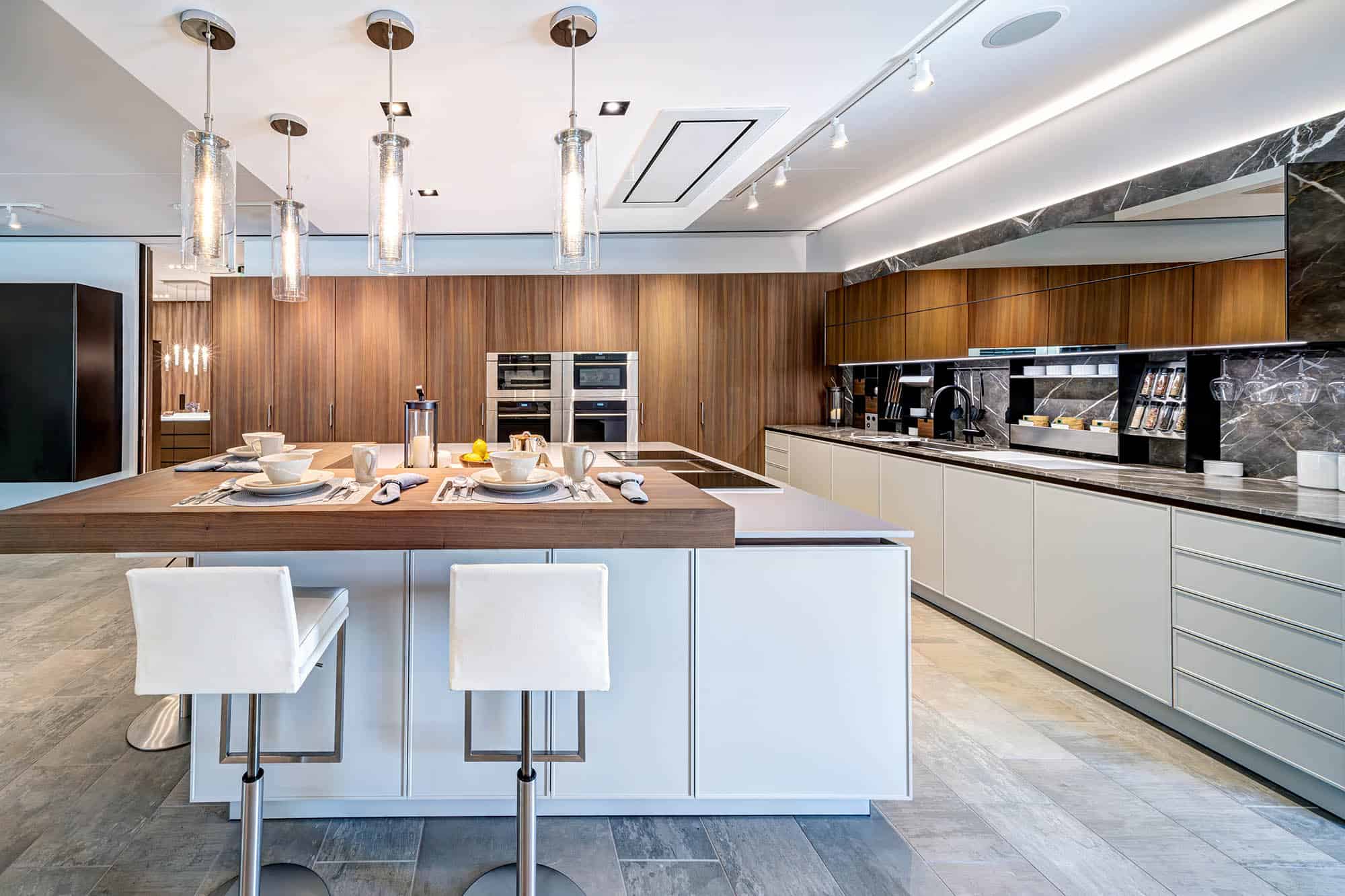 Toledo Shell and Walnut Satin and Vetro Bronze Mirror finishes on eggersmann's classic cabinetry collection