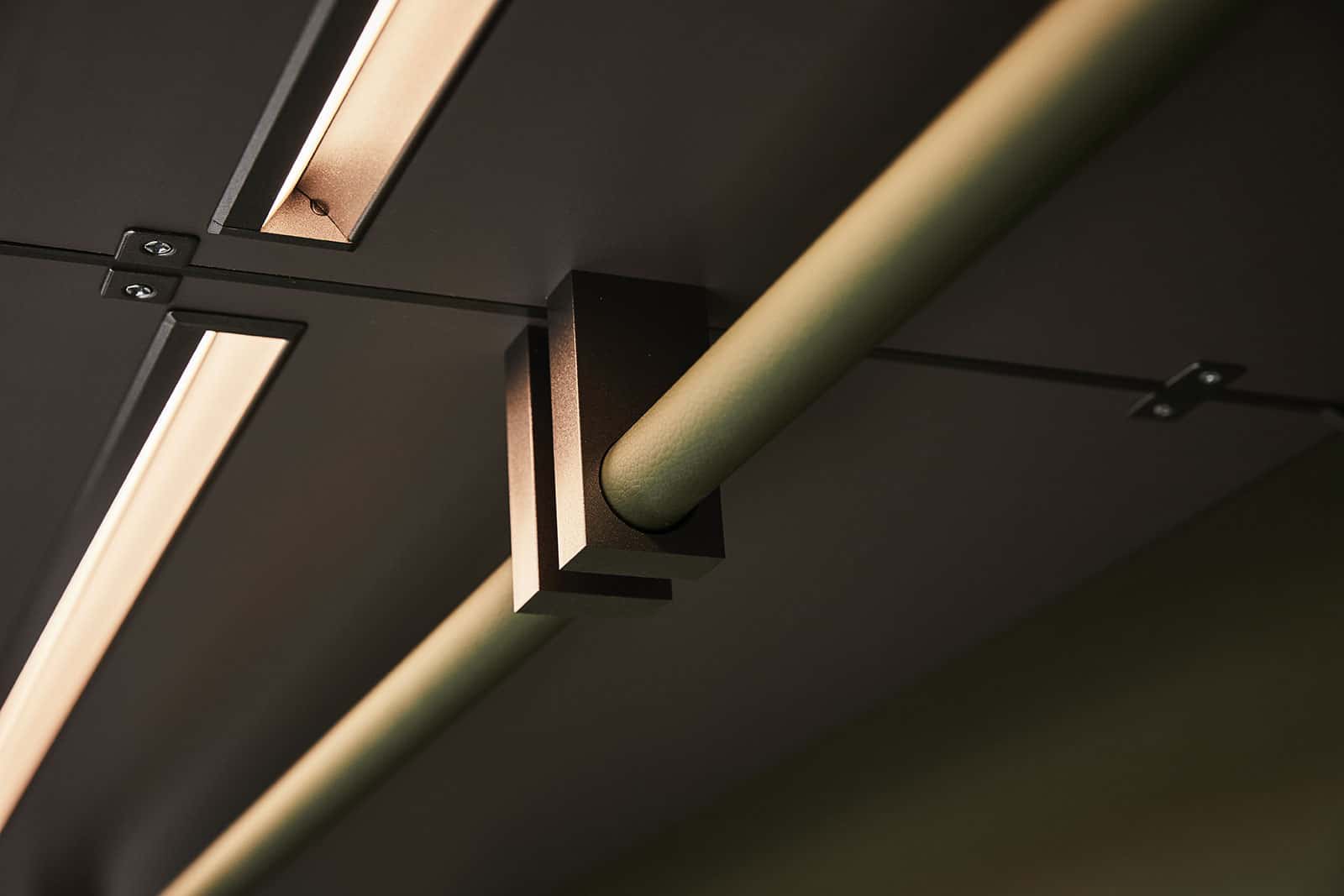high quality hanging rails in a custom luxury walk-in closet