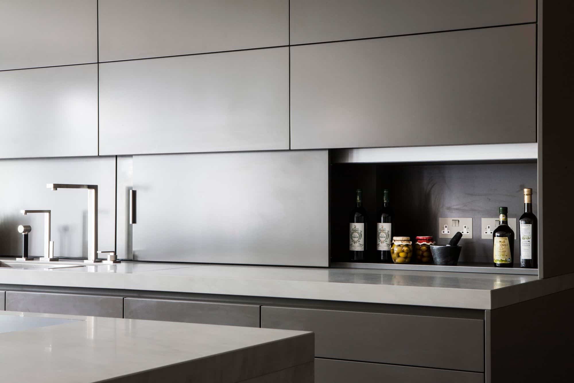 hidden backsplash storage to reduce clutter