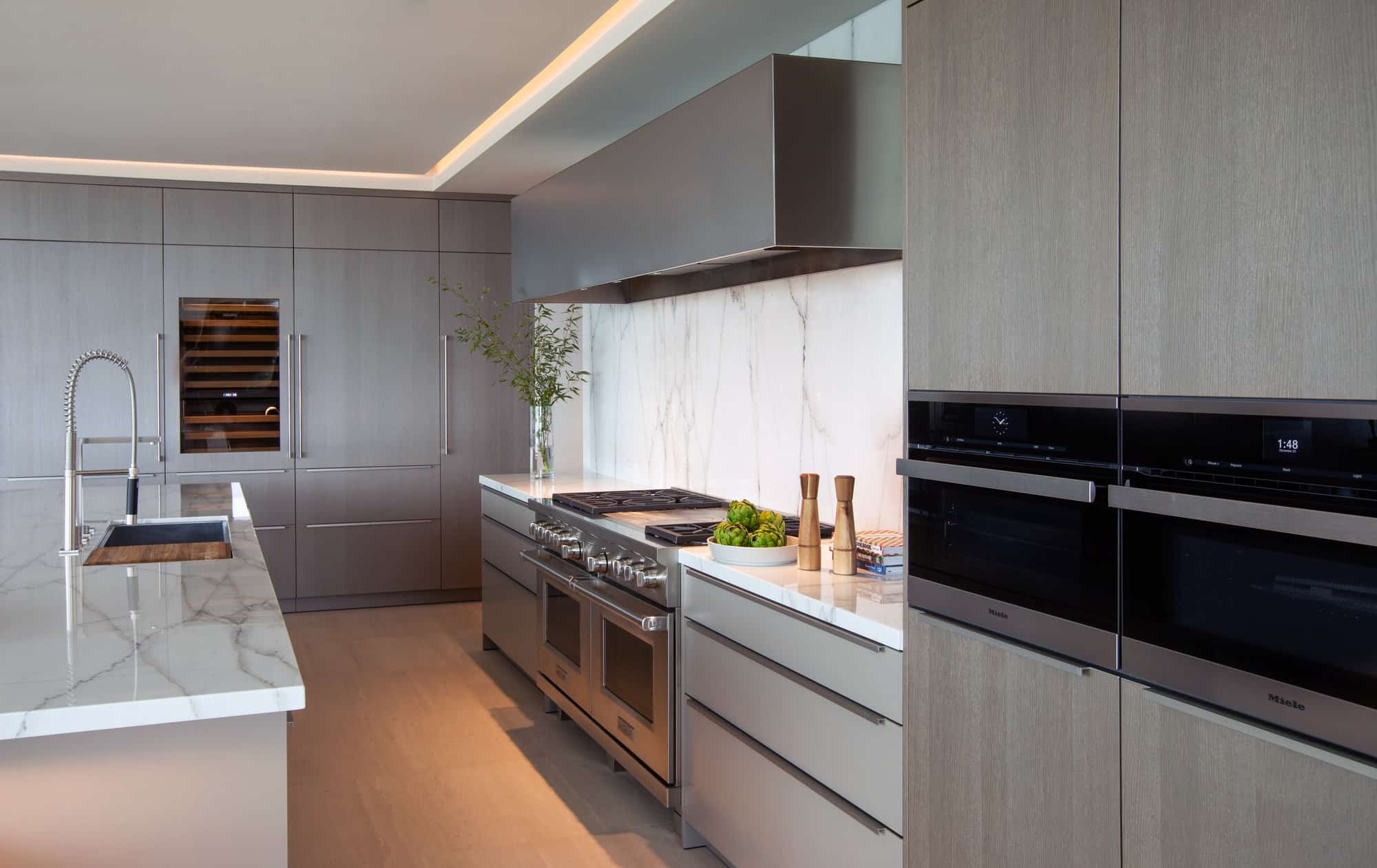 high-end appliances and natural finishes in a corona del mar home's luxury contemporary kitchen