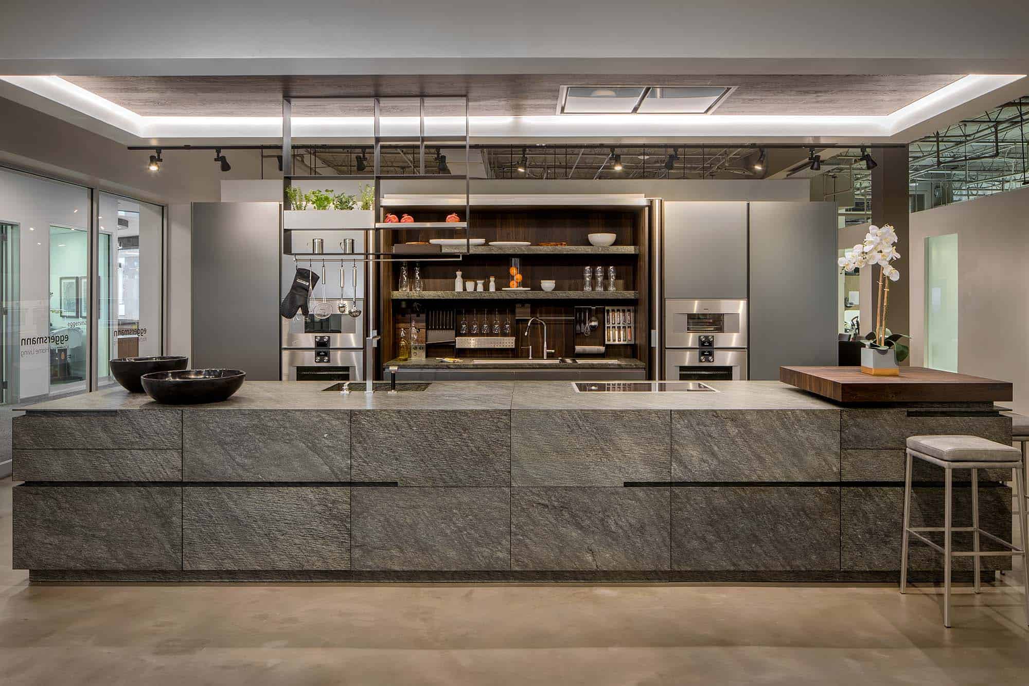 open hidden pantry in a stone kitchen