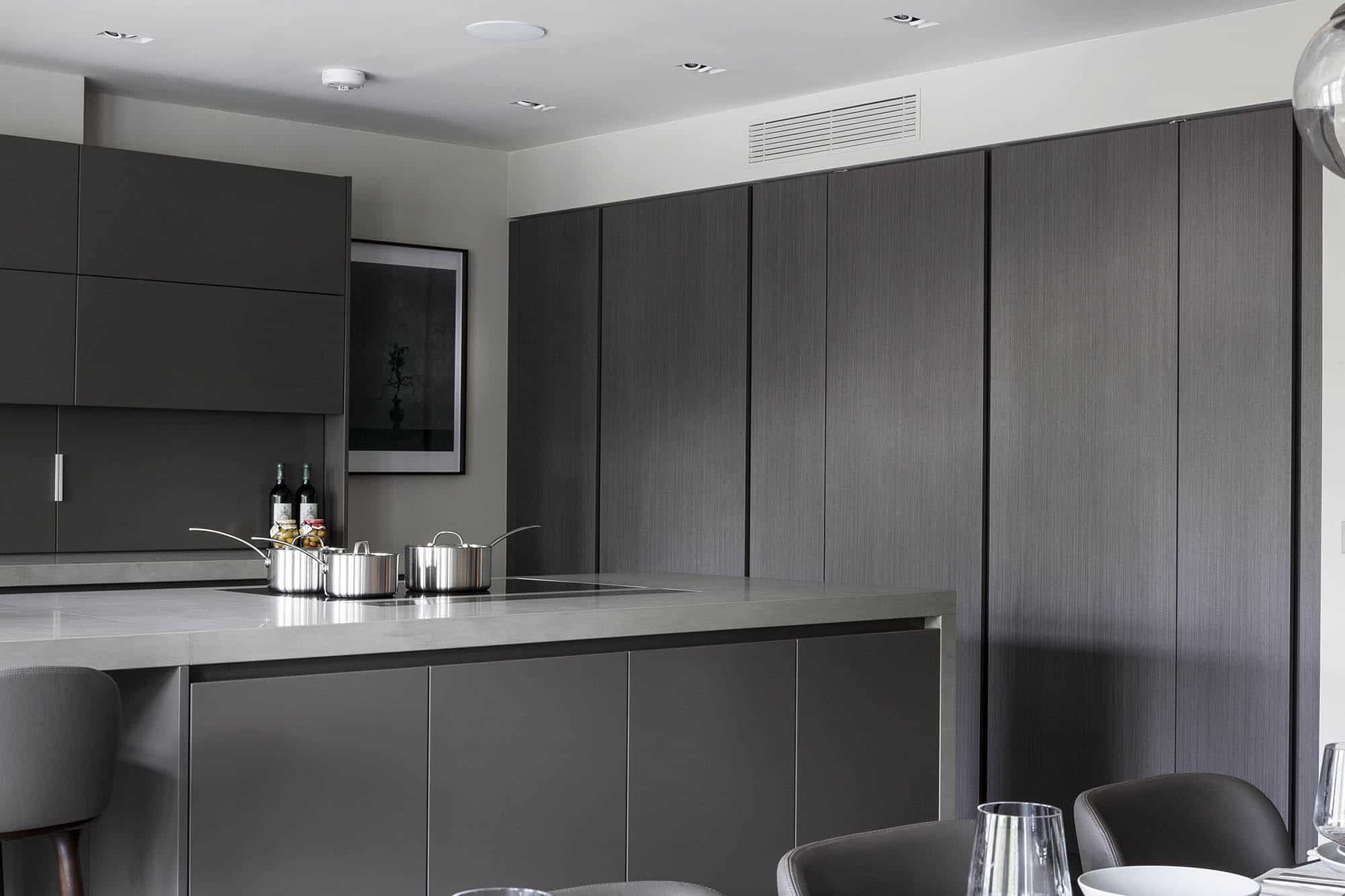 concealed integrated appliances in a luxury modern kitchen