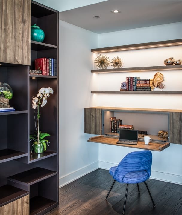 hidden desk build into luxury custom shelves in unit 601 at the mond luxury condos