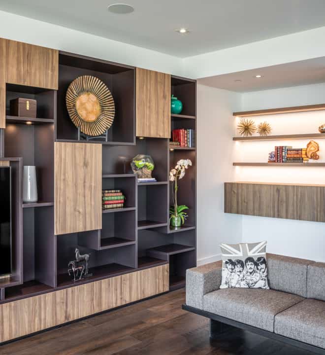 custom media unit for art display and practical storage in unit 601 at the mond luxury condos