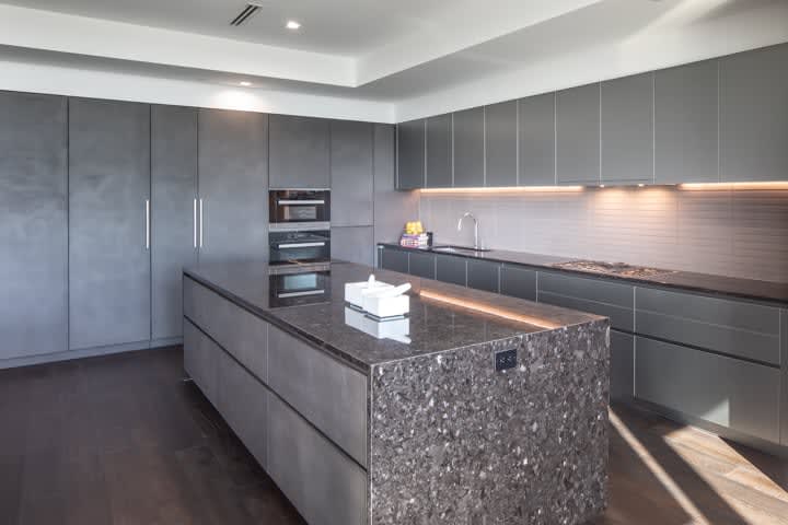 unique stone kitchen in unit 601 kitchen at the mond luxury condos