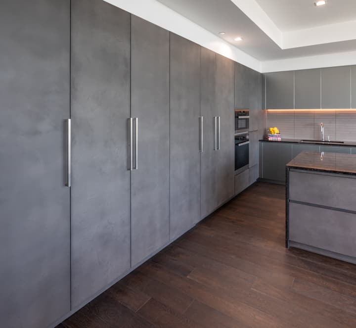 integrated luxury appliances on a tall german cabinet wall in unit 601 kitchen at the mond luxury condos