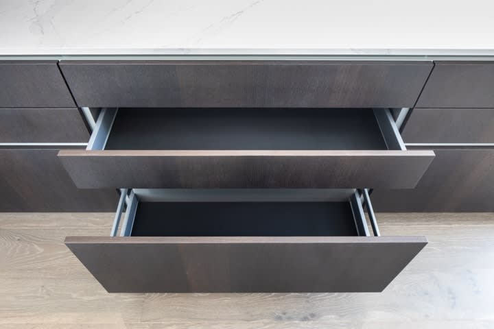 ample drawers in the kitchen of in the condo unit 730 of the mond at the museums