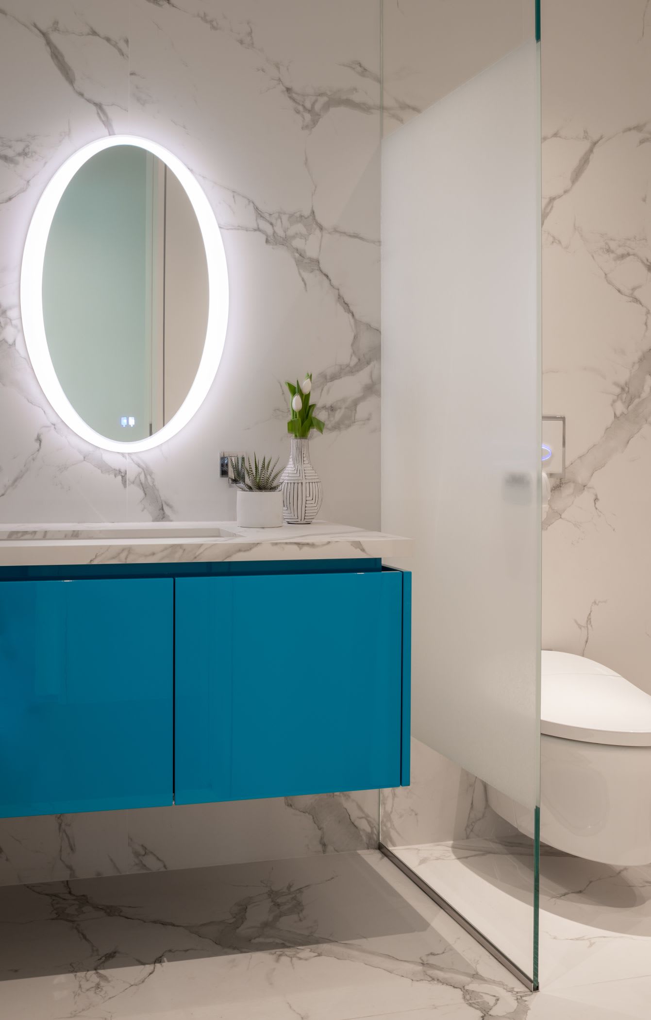 eggersmann custom porsche blue on a powder room vanity is achieved with a custom lacquer system