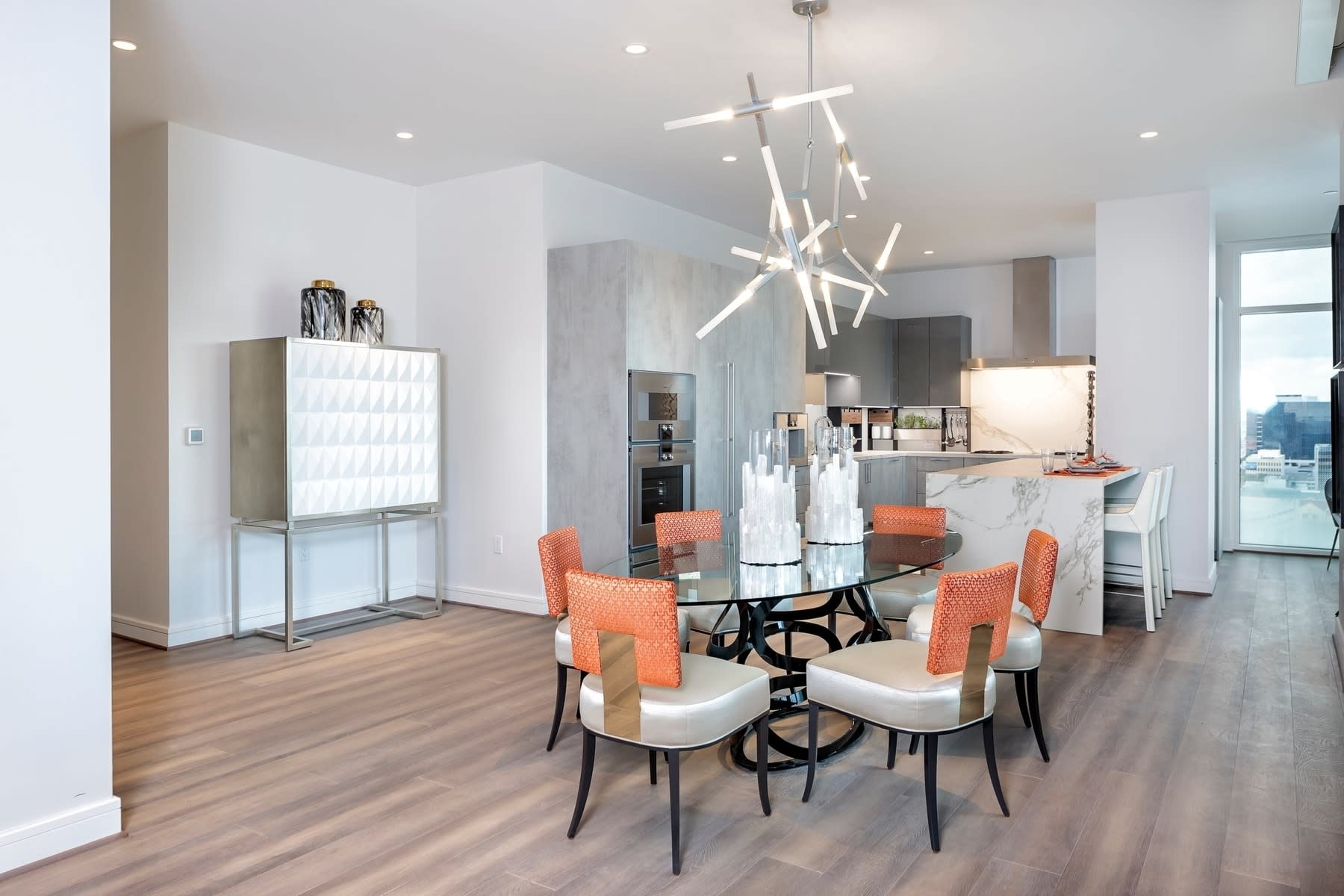 dining area of the eggersmann bespoke kitchen in the model unit of arabella luxury condos in houston