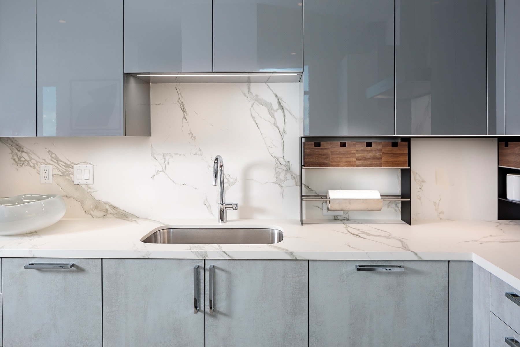 kitchen sink and german cabinetry in the model unit of arabella luxury condos in houston