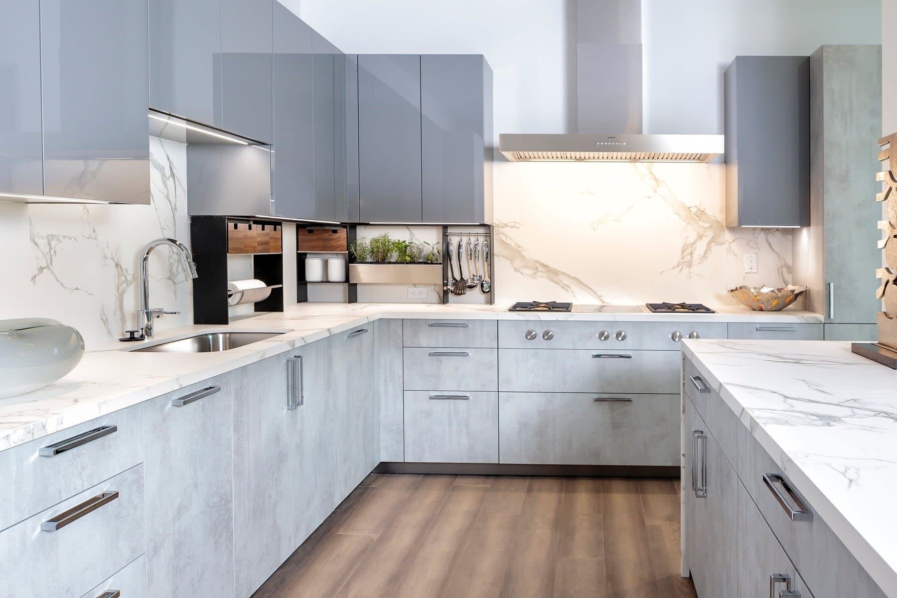 eggersmann luxury kitchen with two-tone cabinets and marble countertops