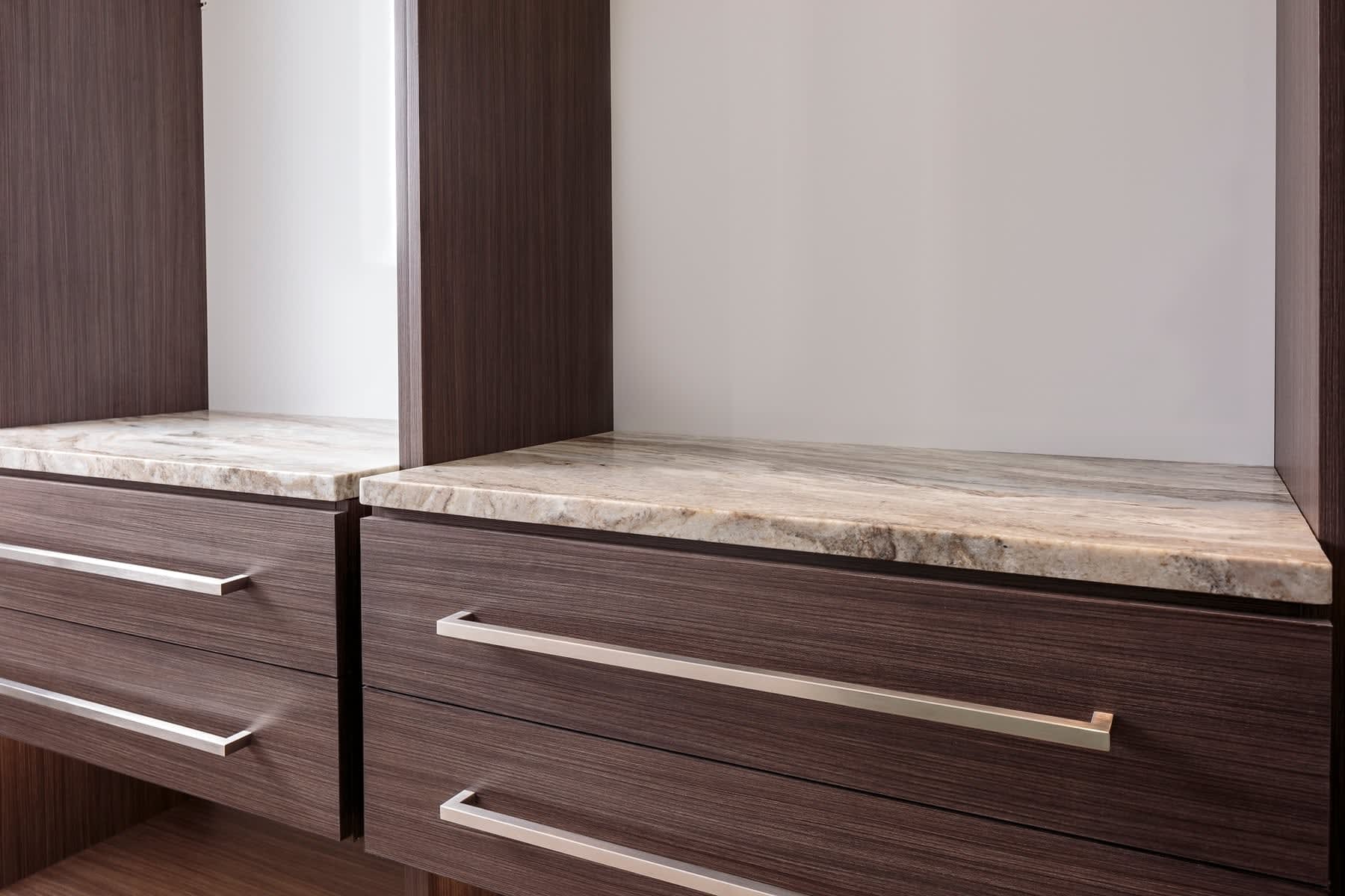 custom drawers in a schmalenbach wardrobe designed by eggersmann in the model unit of arabella luxury condos in houston