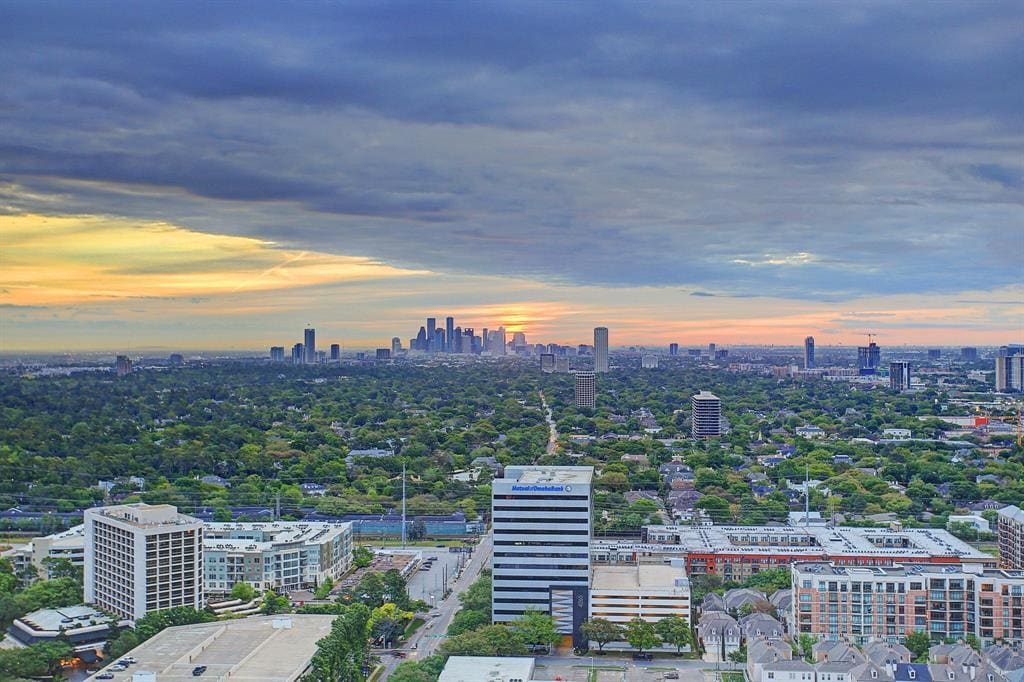 arabella high rise condos skyline view of houston at dawn