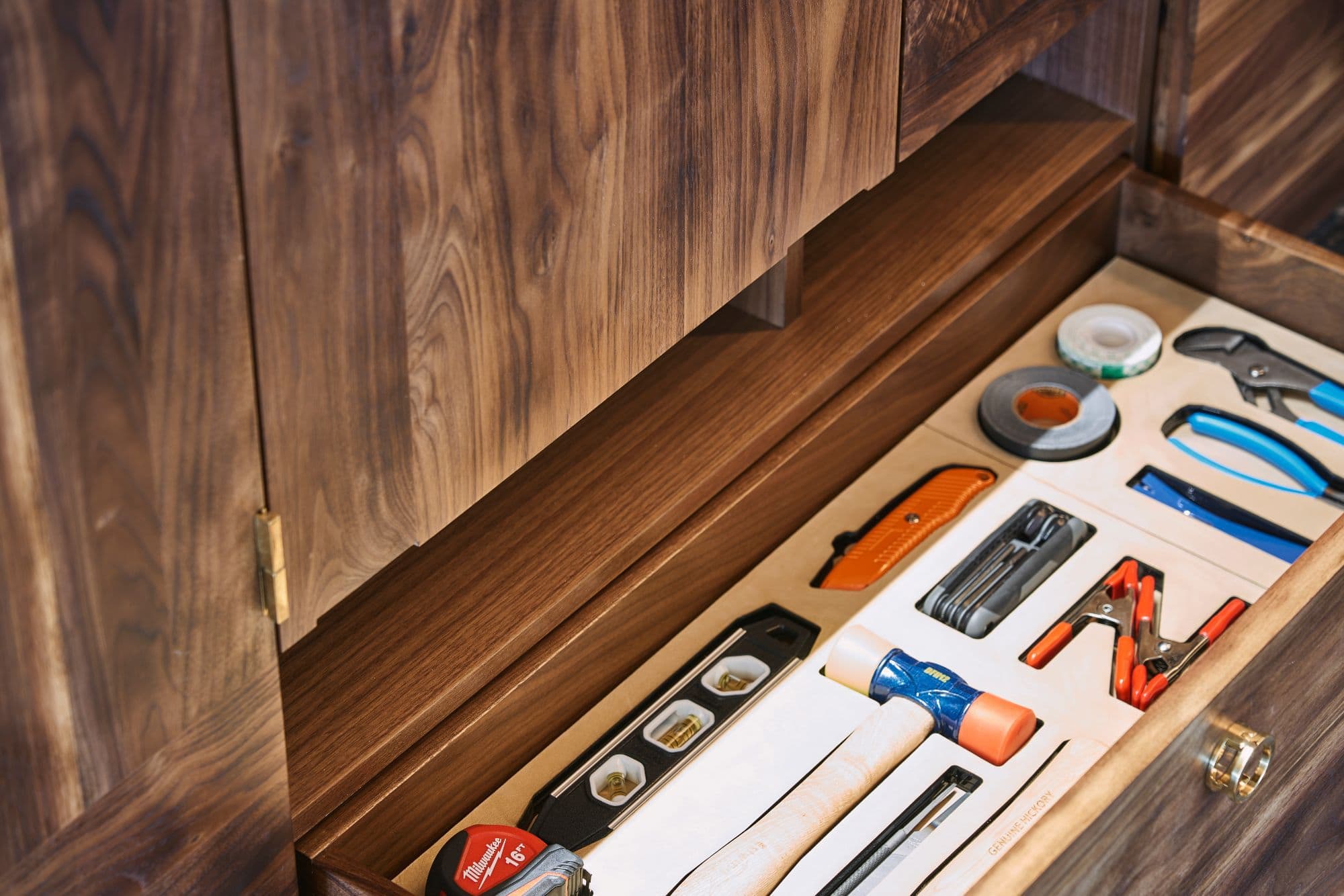 custom tool draw molded to exactly fit household tool necessities inside a penthouse of the arabella luxury high rise in houston