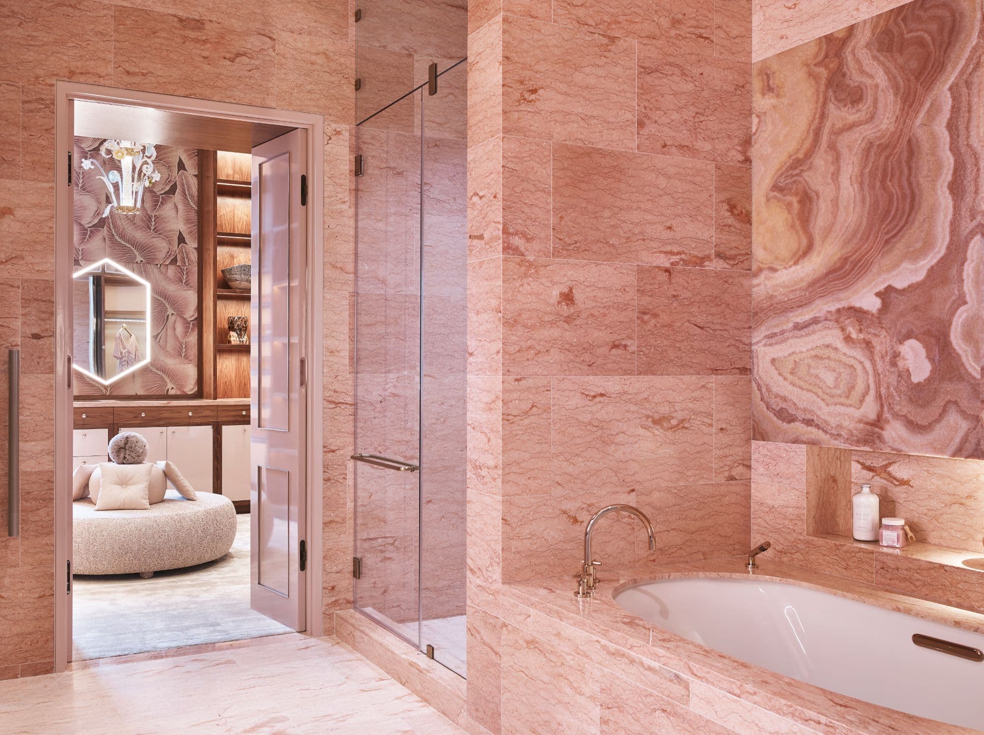 "her" pink marble master bath inside a penthouse of the arabella luxury high rise in houston